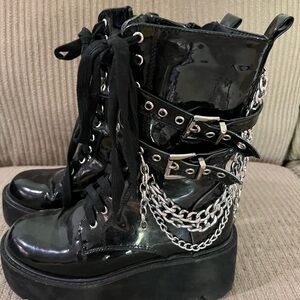 Women’s Pleather Black platforms with chains. Women size 6 1/2.